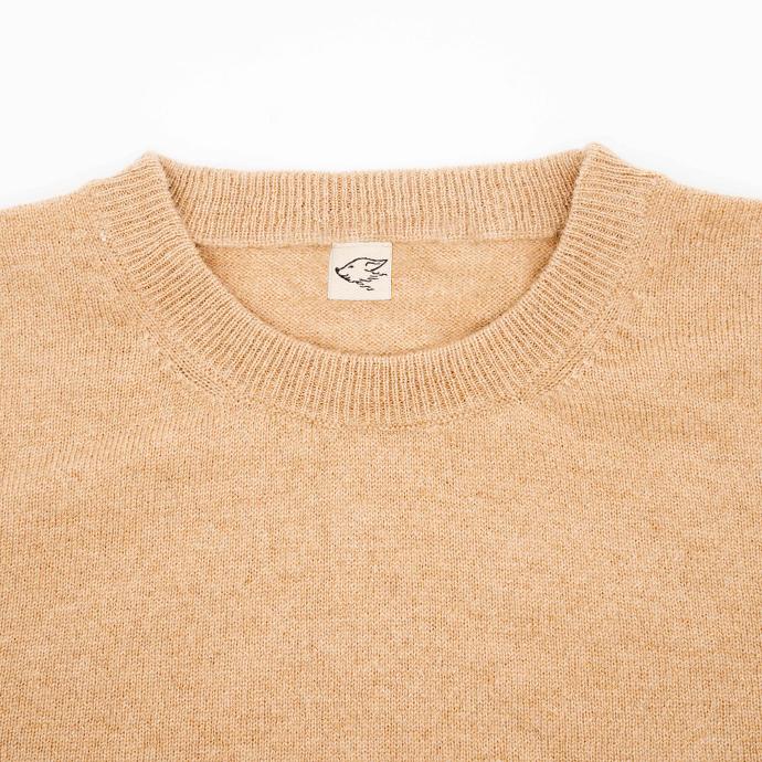 Immer ein steppenstrolch mit dabei Pullover aus Kamelwolle mit steppenstrolch-Logo im Nacken